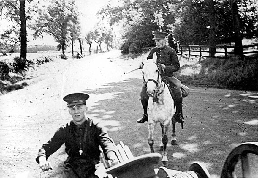 Mounted lineman following cable wagon